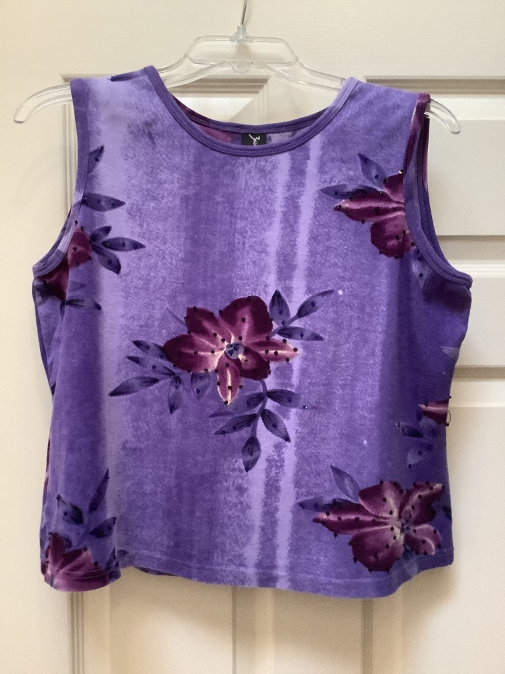 Zashi sleeveless purple top with sequins accent. Size large